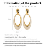 French-style openwork oval silver pin earrings