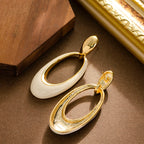 French-style openwork oval silver pin earrings