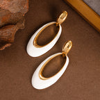 French-style openwork oval silver pin earrings