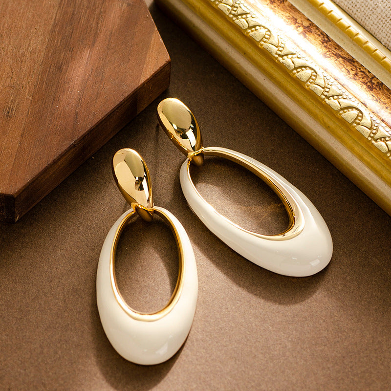 French-style openwork oval silver pin earrings